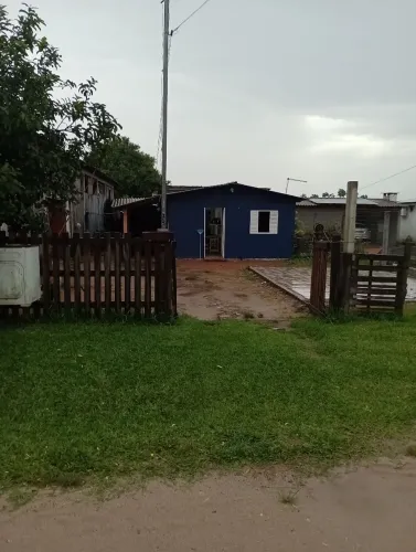 Terreno 11x 30 com duas casas