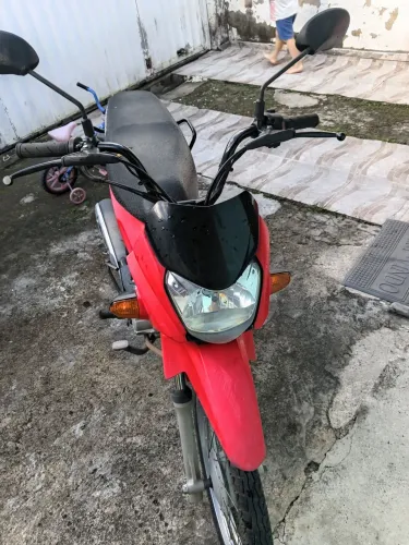 Vendo uma moto ronda pop 110 em perfeito funcionamento único dono