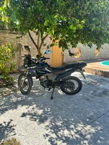 Xre único dono quitada nada fazer baixa quilometragem original