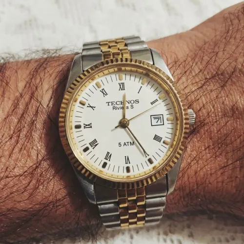 Relógio Original TECNOS Prateado e Banhado a Ouro.