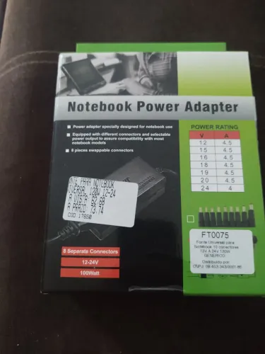 Carregador universal novo com adaptador