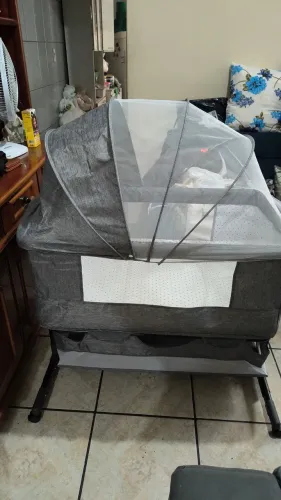 Berço portátil com mosqueteiro
