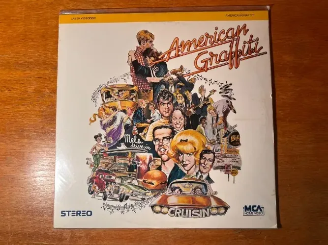Laserdisc American Graffiti (Loucuras de Verão) - RELÍQUIA AINDA NO PLÁSTICO - RARO