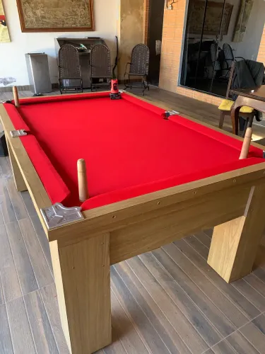 Troca de pano de mesa de sinuca