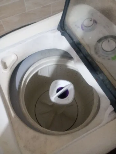Máquina de lavar com defeito