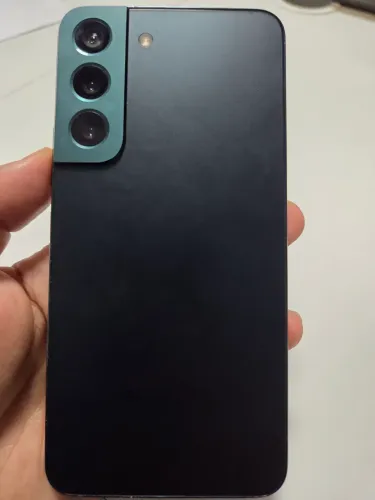 Celular funcionando, porém com defeito.