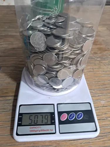 Moedas vendidas por kilo 