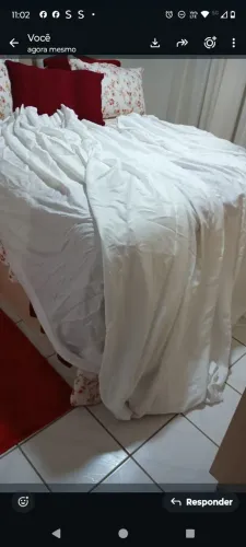 Curtina usada com um pequeno defeito