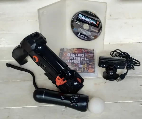 LotePlayStation 3 Move + Câmera PS Eye + Pistola + 2 Jogos Físicos (GTA 4 e Dead Rising 2)