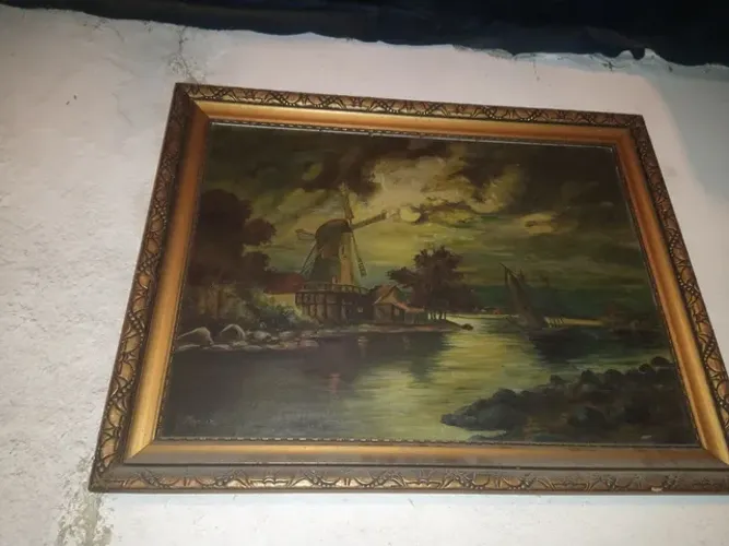 Quadro paisagem e roda de vento lindoo