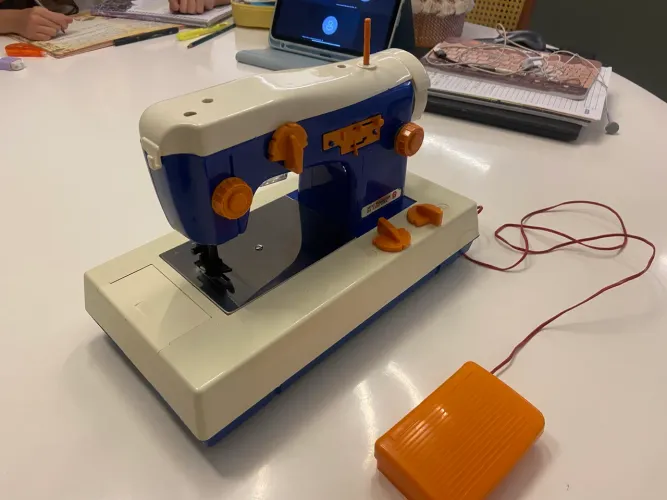 Máquina de costura de brinquedo estrela