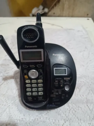 Telefone Panasonic sem fio com secretaria eletrônica embutida para conserto