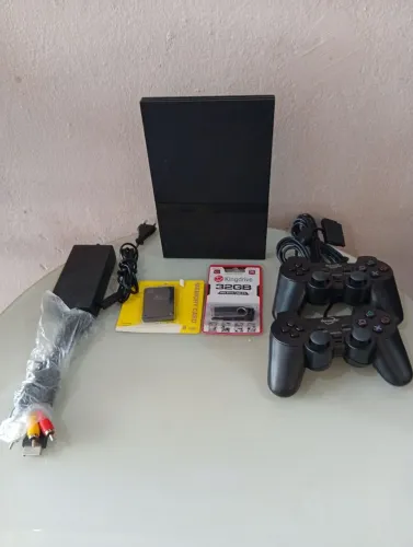 Playstation 2 slim com 45 jogos contoles novos