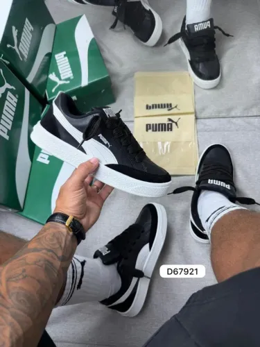 Tênis masculino e feminino primeira linha 