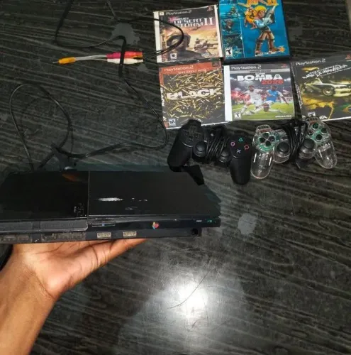 Kit Completo de PS2 completo acompanha 2 controle cabos originais e uma seleção dejogos