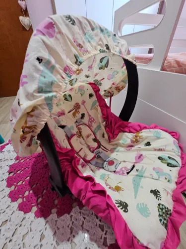 Bebê Conforto Burigotto com base.