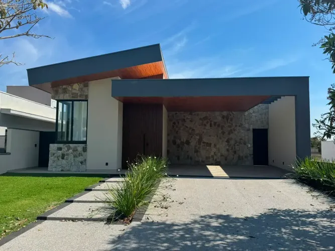Casa de condomínio para venda tem 248 metros quadrados com 4 quartos