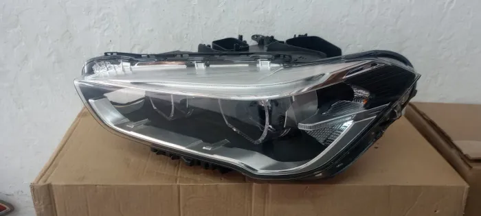 FAROL BMW X1 2016/2019 novo original sem módulos 