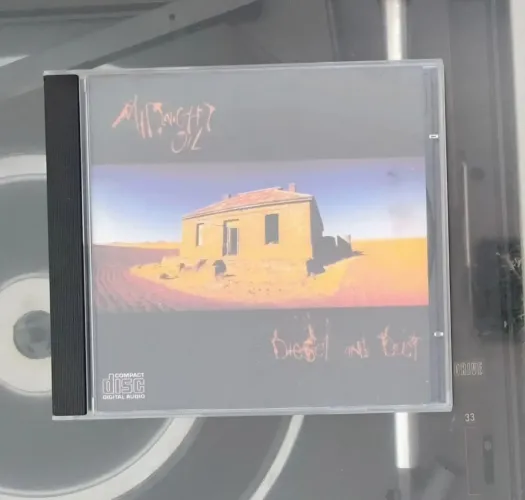 CD Midnight Oil " Diesel and Dust" (usado)