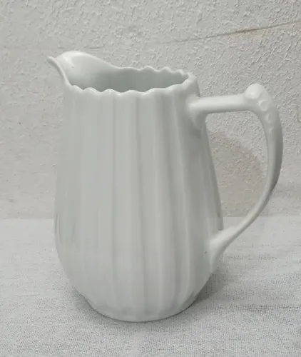 1 leiteira e 1 açucareiro branco de porcelana Real