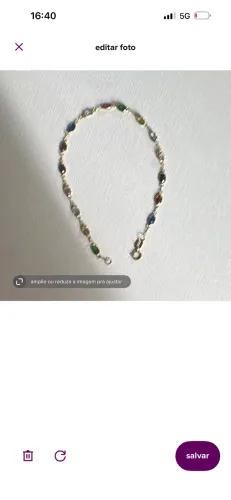 Vendo pulseira de ouro 18 k, com pedras de zircônia coloridas.