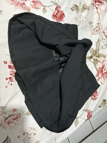 Short saia preta plissada