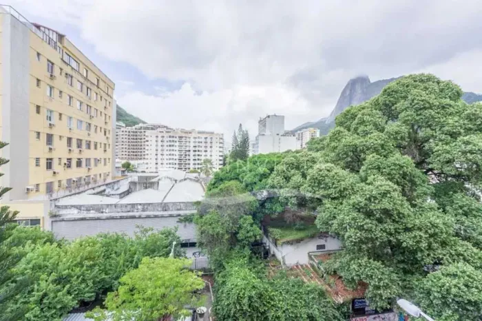 DOIS QUARTOS DUAS VAGAS ESCRITURA REGIÃO CENTRAL BOTAFOGO