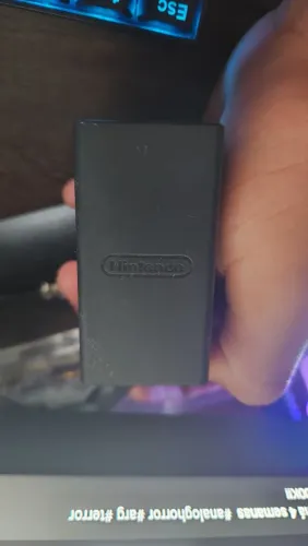Nintendo switch lite com 1 ano online e jogos