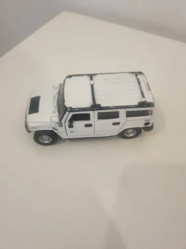 Carrinho de ferro suv hummer maisto