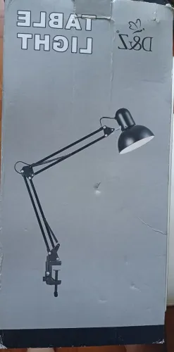 Luminária de mesa , articulada, regulável.