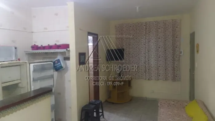 Aconchegante Casa à Venda no Ocian, Praia Grande - 1 Quarto e Garagem