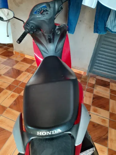 Biz 110i pouco usada