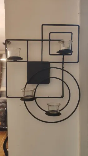 Escultura com porta velas