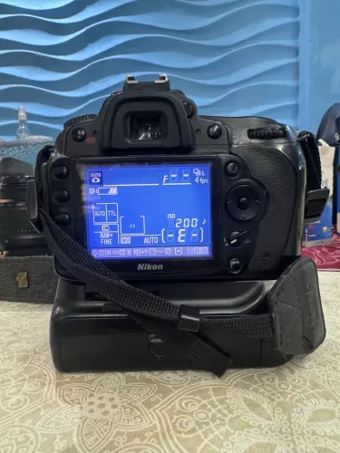 Câmera D90 com grip