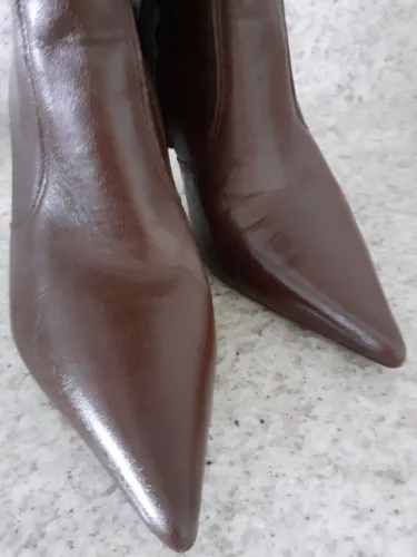Bota cano alto.