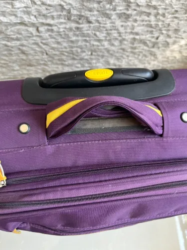 Mala pequena rodinhas Luca roxa