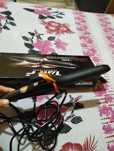 Modelador de cachos da Taiff usado uma vez vendo por 150 vindo pega no Alvorada 2 faço o t