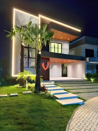 Casa com 5 dormitórios à venda, 289 m² por R$ 1.950.000 - Cidade Alpha - Eusébio/CE