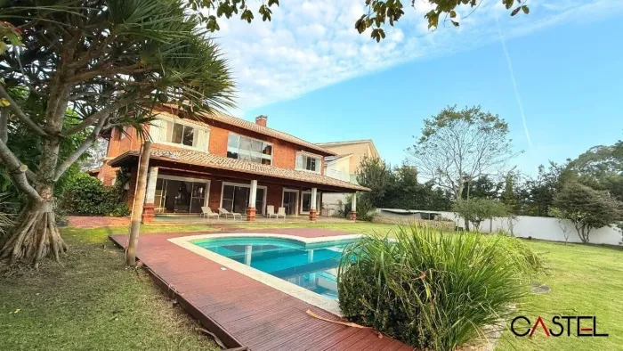 Casa 4 suítes com piscina aquecida no condomínio Terra Ville em Porto Alegre para alugar