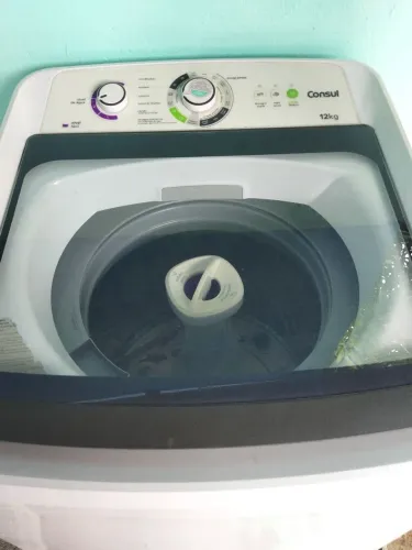 Máquina de lavar roupa com defeito