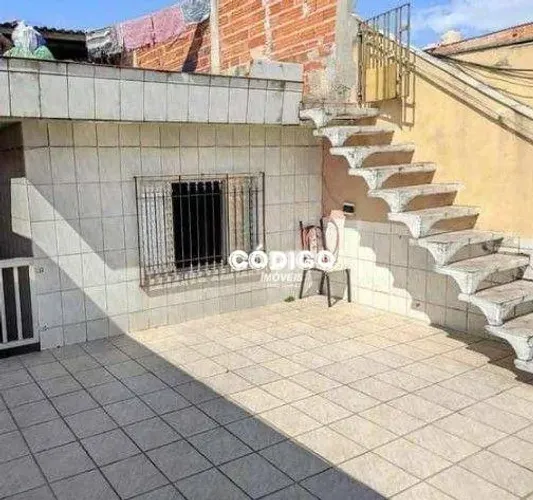 Terreno com 3 casas à venda por R$ 425.000 - Vila Flórida - Guarulhos/SP
