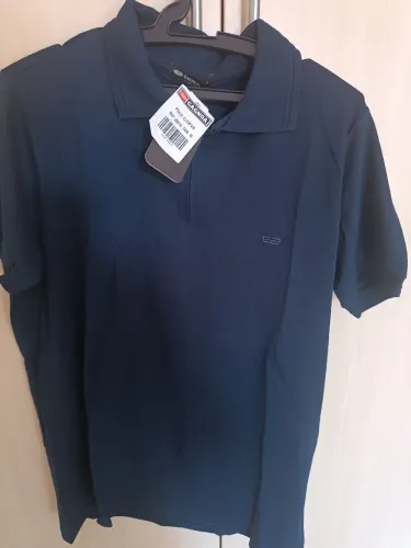 Camisa polo na etiqueta Tam M