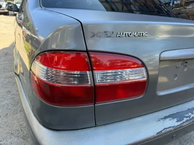 Lanterna Lado Esquerdo Toyota Corolla 2001 - Rs Auto Peças 