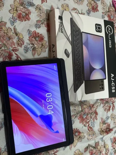 Tablet AJ-C58 Semi-Novo. Informações adicionais e acessórios listados na descrição.