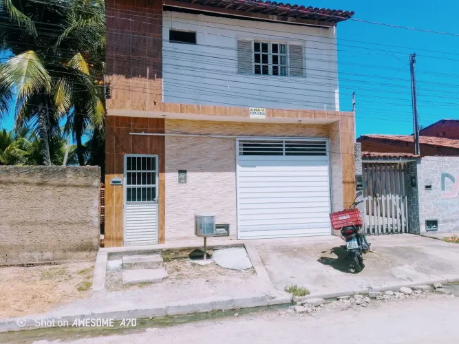 Casa com suítes privativas a beira mar