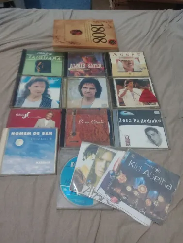 15 cds e um livro de brinde
