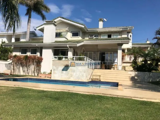 Casa com 4 dormitórios à venda, 429 m² por R$ 4.500.000,00 - Condomínio Flamboyant - Atiba