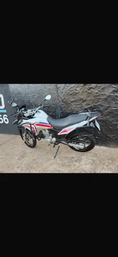 Moto muito bem conservada pneus e aros novos 