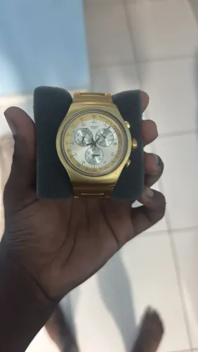 Swatch cara branca série ouro