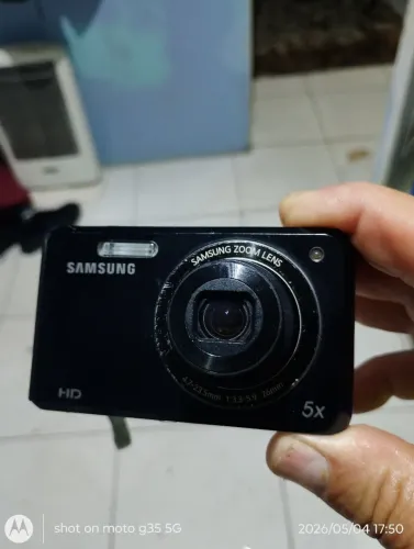 câmera digital 16.1 megapixel lente 26 mm marca Samsung